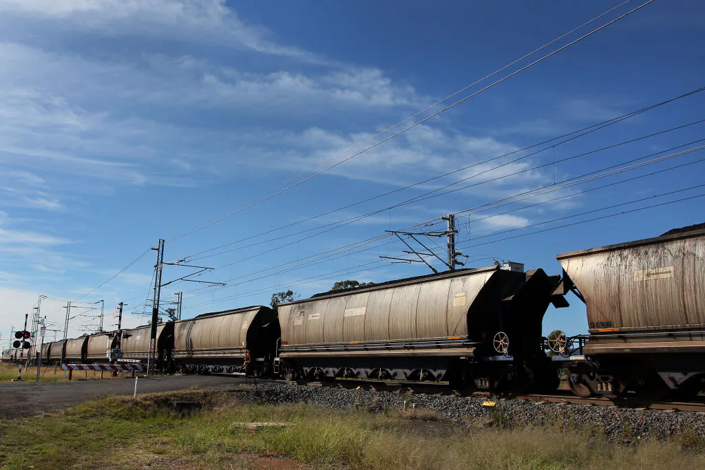 A coal train is seen moving parallel to the A4 Highway in the Clermont and Blackwater region in Queensland, Australia, on April 29, 2019. (Lisa Maree Williams/Getty Images)