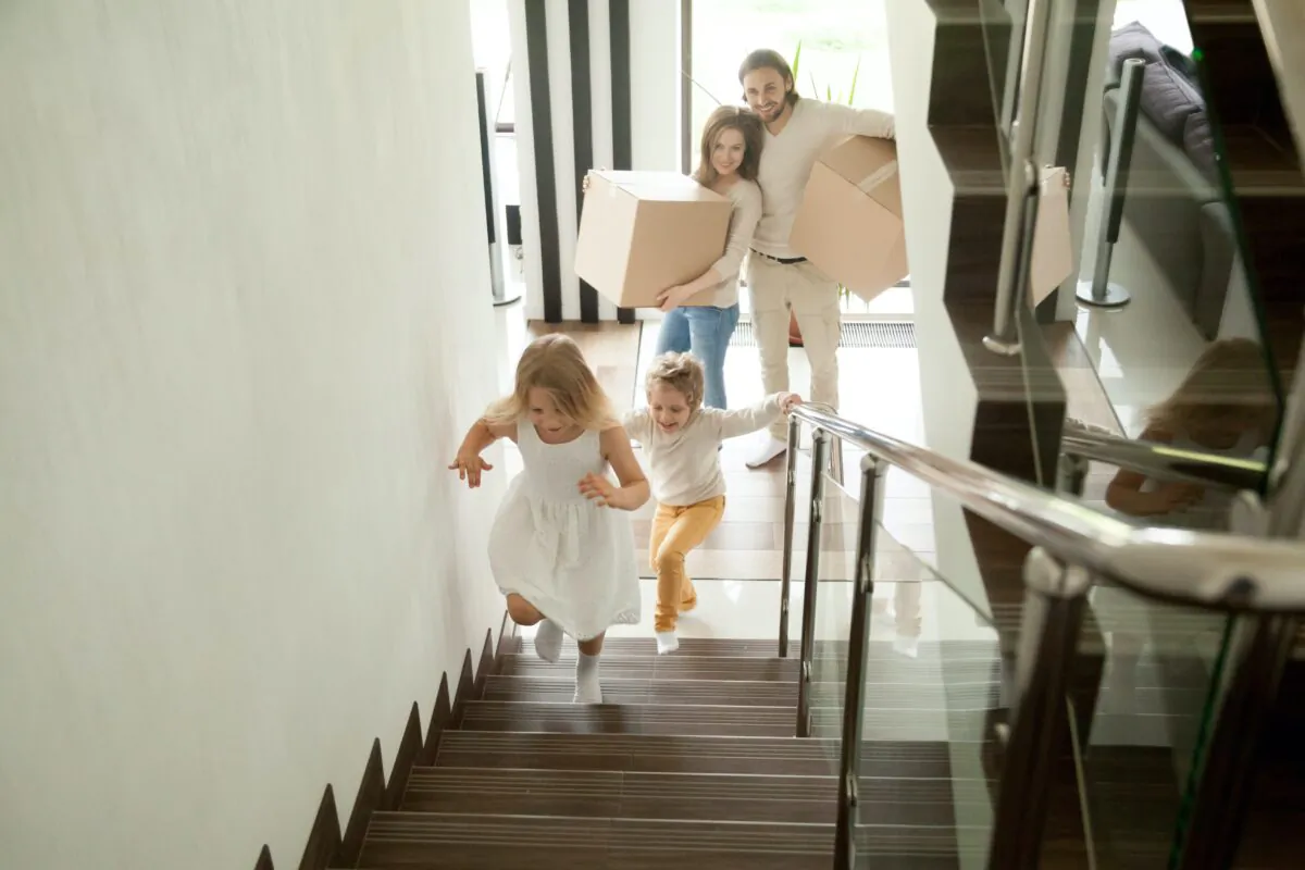 A stair railing ensures safe footing and passage on a stairway (fizkes/Shutterstock)