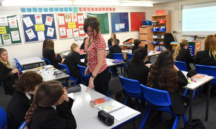 A teacher speaks to the class at Copley Academy in Stalybridge, England, on Sept. 9, 2021. (Anthony Devlin/Getty Images)