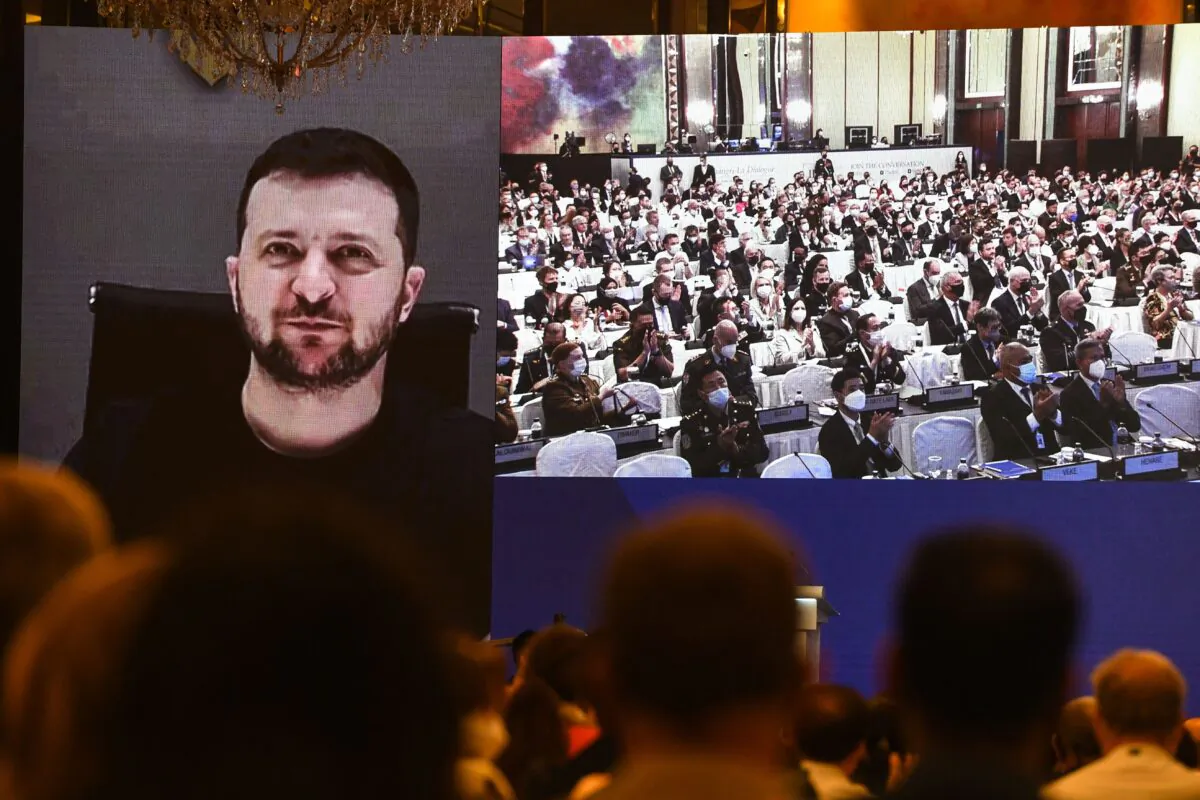 Ukraine's President Volodymyr Zelenskyy addresses participants at the Shangri-La Dialogue summit via a video link in Singapore on June 11, 2022. (Roslan Rahman/AFP via Getty Images)