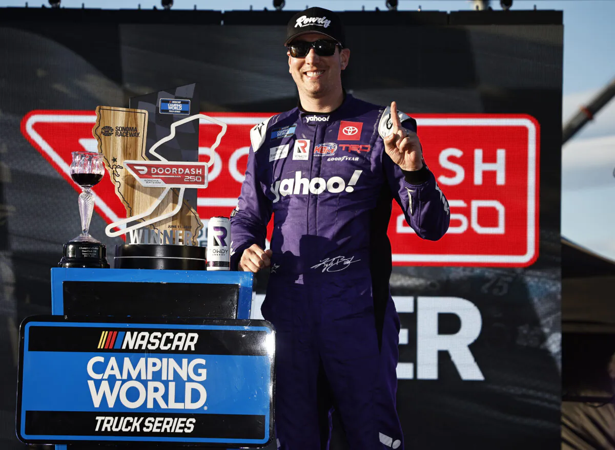 Kyle Busch, driver of the #51 yahoo! Toyota, celebrates in victory lane after winning the NASCAR Camping World Truck Series DoorDash 250 at Sonoma Raceway in Sonoma, Calif., on June 11, 2022. (Chris Graythen/Getty Images)