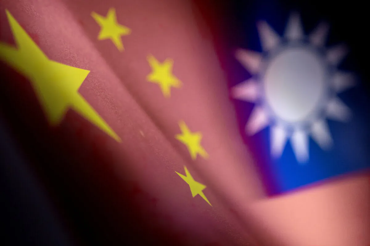 The Chinese and Taiwanese printed flags, on April 28, 2022. (Dado Ruvic/Reuters)