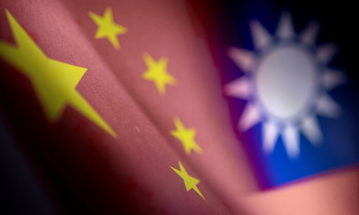 The Chinese and Taiwanese printed flags, on April 28, 2022. (Dado Ruvic/Reuters)