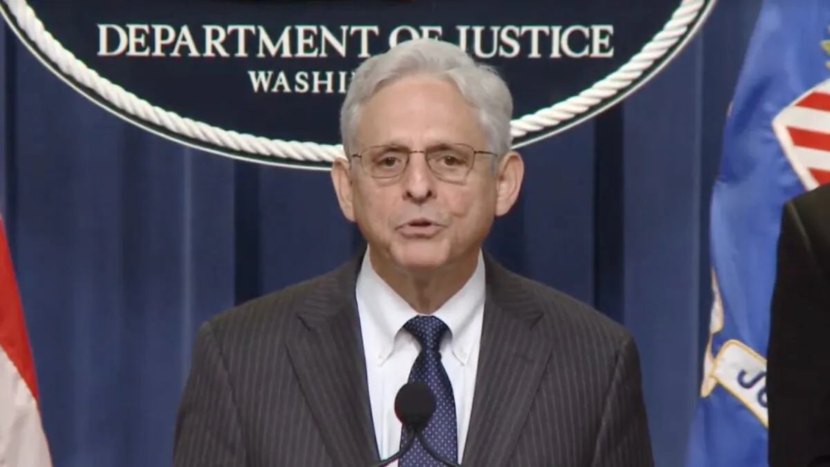 Attorney General Merrick Garland announces a “significant firearms trafficking enforcement action.” in Washington, on June 13, 2022. (DOJ/Screenshot via NTD)