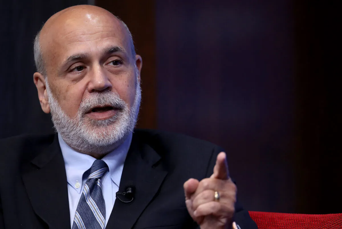 Former Federal Reserve Chairman Ben Bernanke answers questions at a conference with former U.S. Treasury Secretary Timothy Geithner and former U.S. Treasury Secretary Hank Paulson at the Brookings Institution in Washington on Sept. 12, 2018. (Win McNamee/Getty Images)