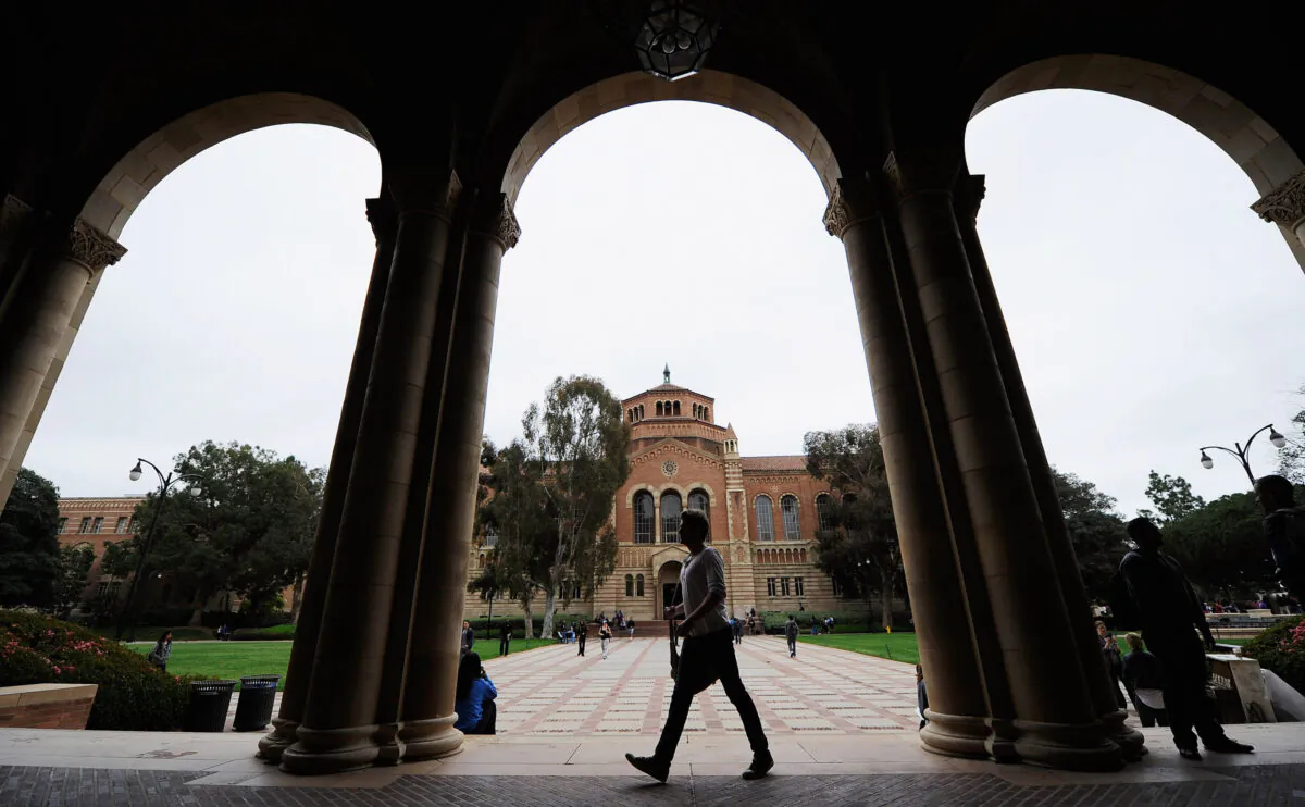 A student walks near Royce Hall on the campus of UCLA in Los Angeles, Calif., on April 23, 2012. (Kevork Djansezian/Getty Images)