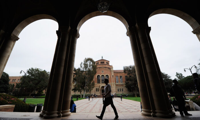A student walks near Royce Hall on the campus of UCLA in Los Angeles, Calif., on April 23, 2012. (Kevork Djansezian/Getty Images)
