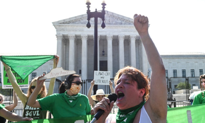 Pro-abortion protesters demonstrate in front of the Supreme Court building amid the ruling that could overturn Roe v. Wade and other court decisions in Washington on June 13, 2022. (Roberto Schmidt/AFP via Getty Images)