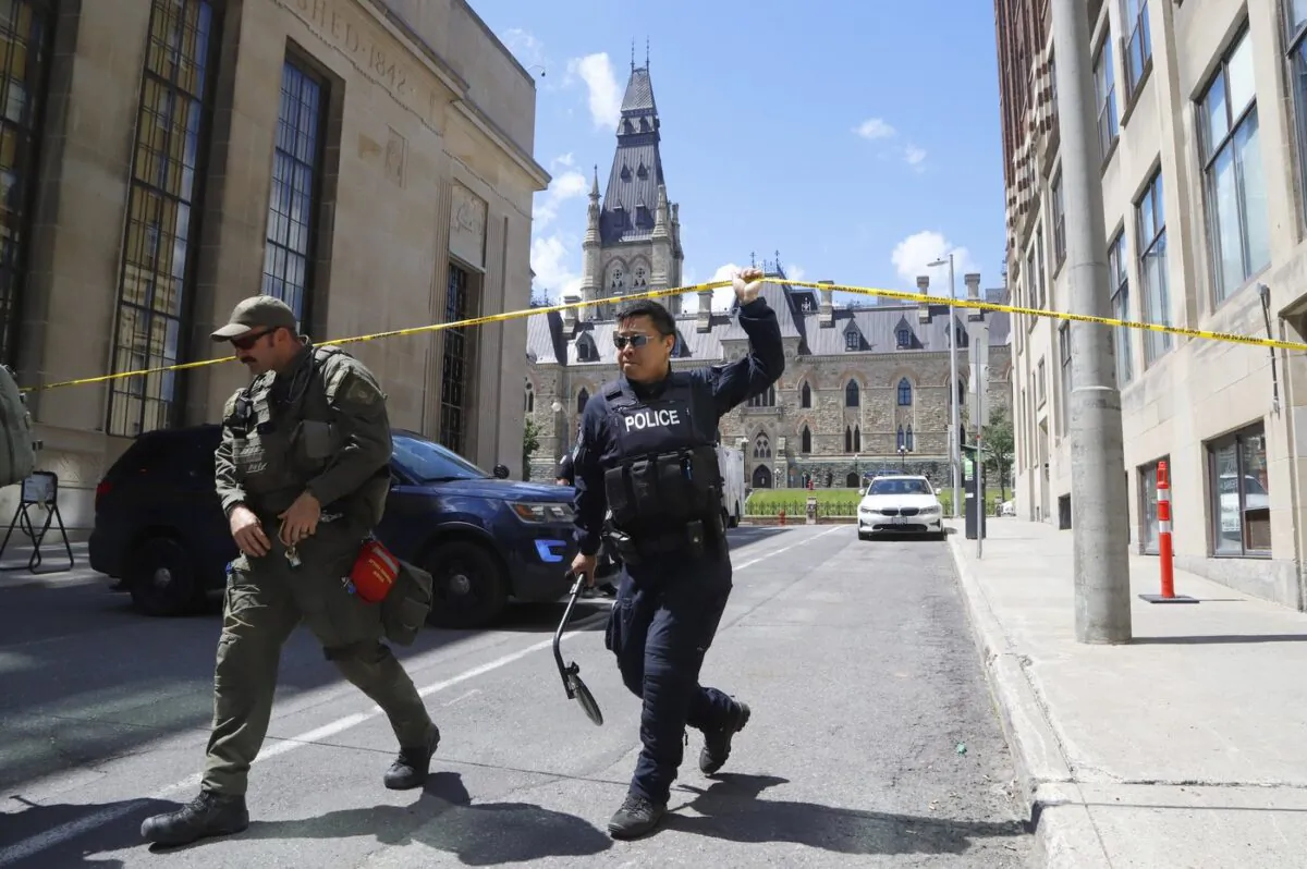 Police respond to an incident on Parliament Hill in Ottawa on June 11, 2022. (The Canadian Press/ Patrick Doyle)