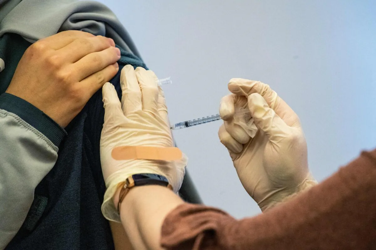 A child receives a Pfizer COVID-19 vaccine in Hartford, Conn., on Jan. 6, 2022. (Joseph Prezioso/AFP via Getty Images)