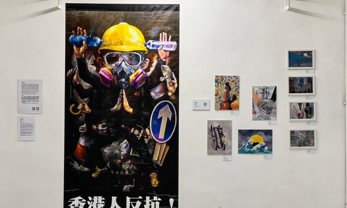 One grand painting "Thousand-handed Man"(千手人), by an artist couple, once displayed in Causeway Bay during the anti-extradition period, is in the exhibition now, albeit with traces of scratched paints when being removed at that time.  (The Epoch Times UK)
