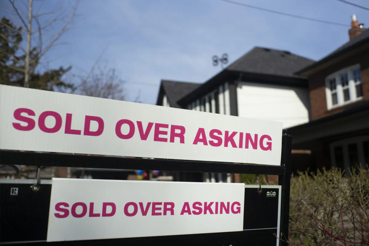 A house that sold for more than the listing price in West-end Toronto, on April 24, 2022. (The Canadian Press/Graeme Roy)