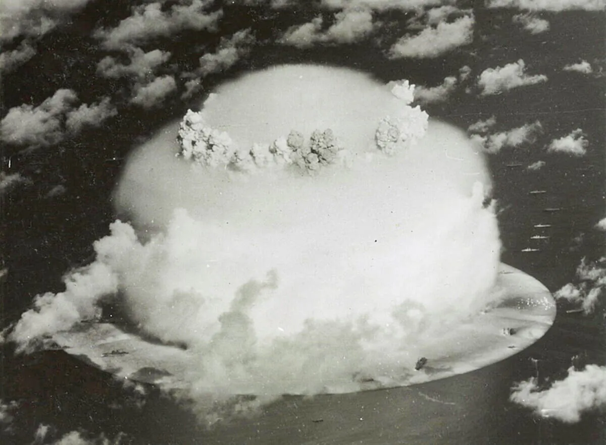 A mushroom cloud rises with ships below during Operation Crossroads nuclear weapons test on Bikini Atoll, Marshall Islands in this 1946 handout. (U.S. Library of Congress/Handout via Reuters)