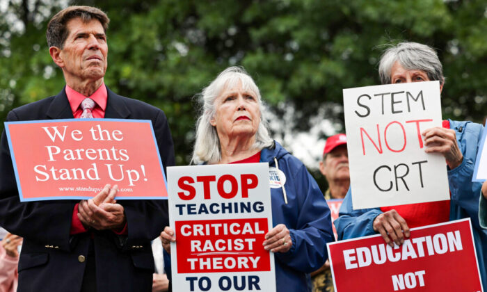 Opponents of the academic doctrine known as critical race theory protest outside of the Loudoun County School Board headquarters in Ashburn, Va., on June 22, 2021. (Evelyn Hockstein/Reuters)