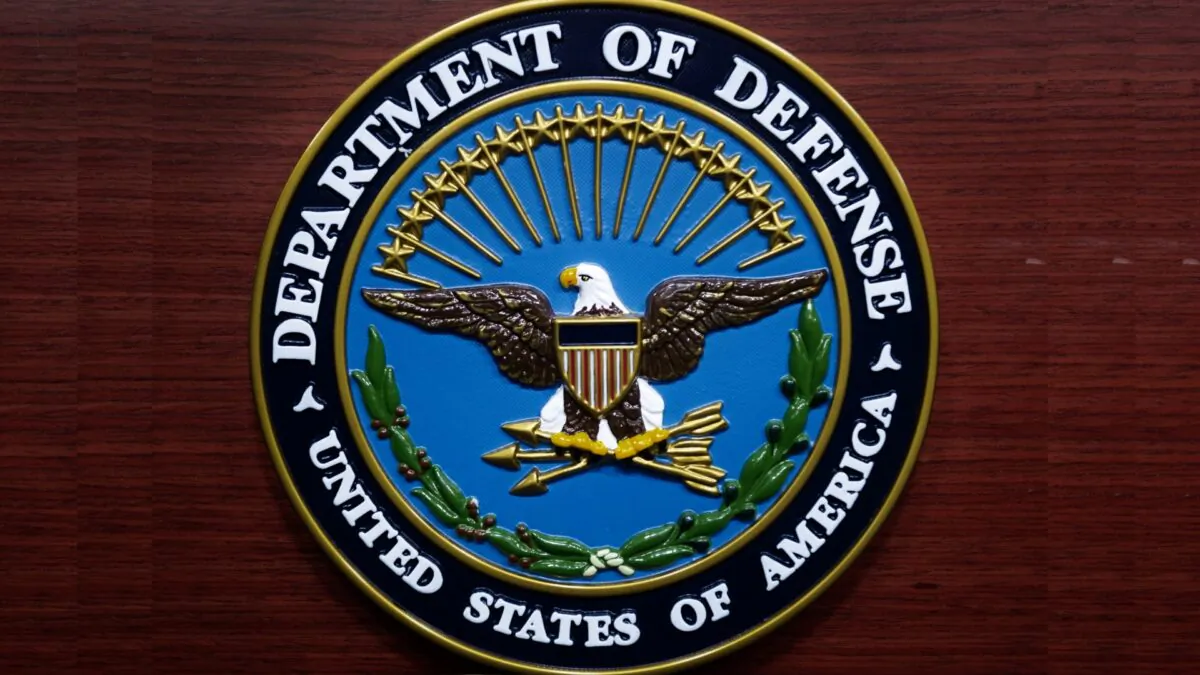 The U.S. Department of Defense seal is seen on the lecturn in the media briefing room at the Pentagon in Washington, DC, on Dec. 12, 2013. (Paul J. Richards/AFP/Getty Images)