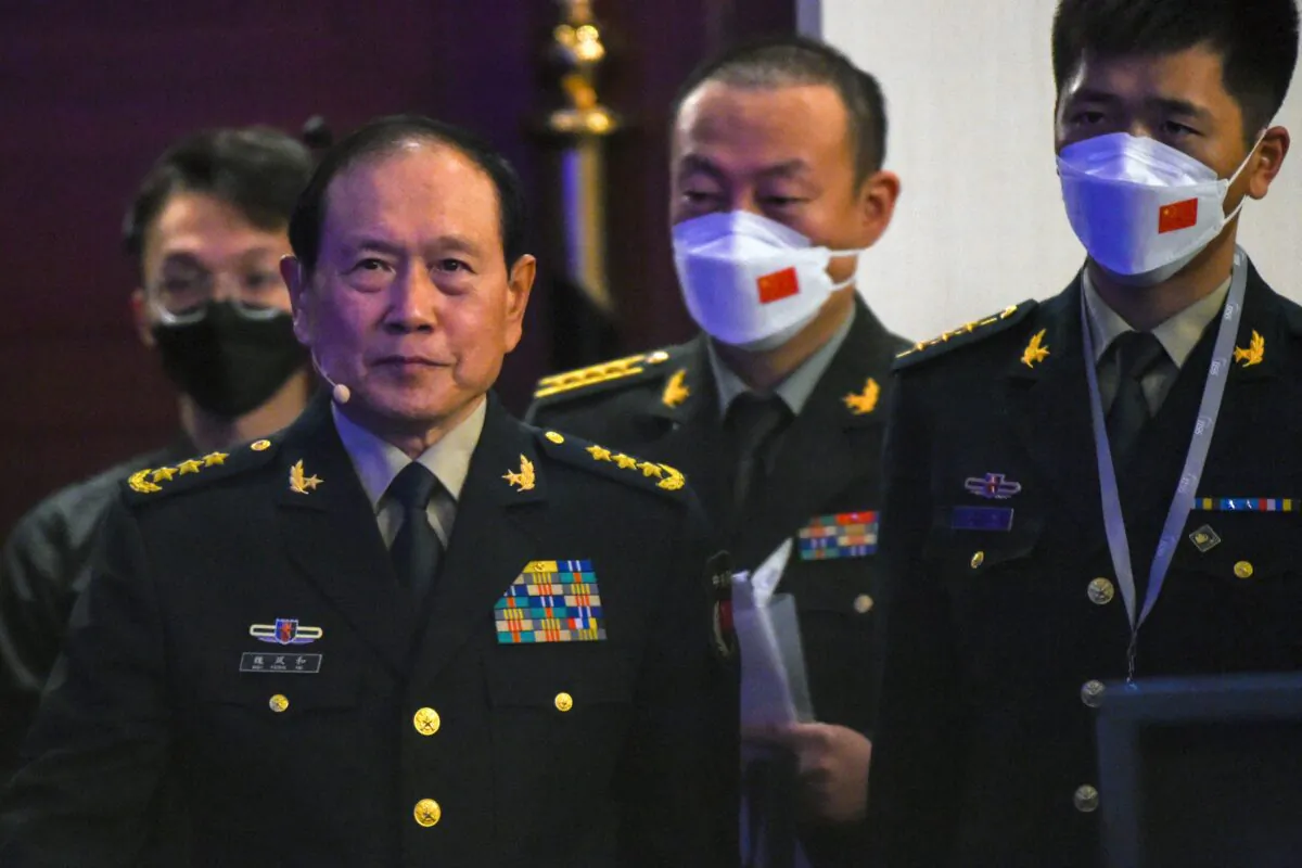 China's Defense Minister Wei Fenghe (front left) attends the Shangri-La Dialogue summit in Singapore on June 12, 2022. (Roslan Rahman/AFP via Getty Images)