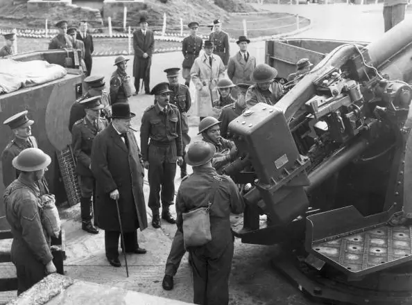 British Prime Minister Winston Churchill observes British soldiers operating an anti-aircraft gun during the Blitz, London, England. (Hulton Archive/Getty Images)