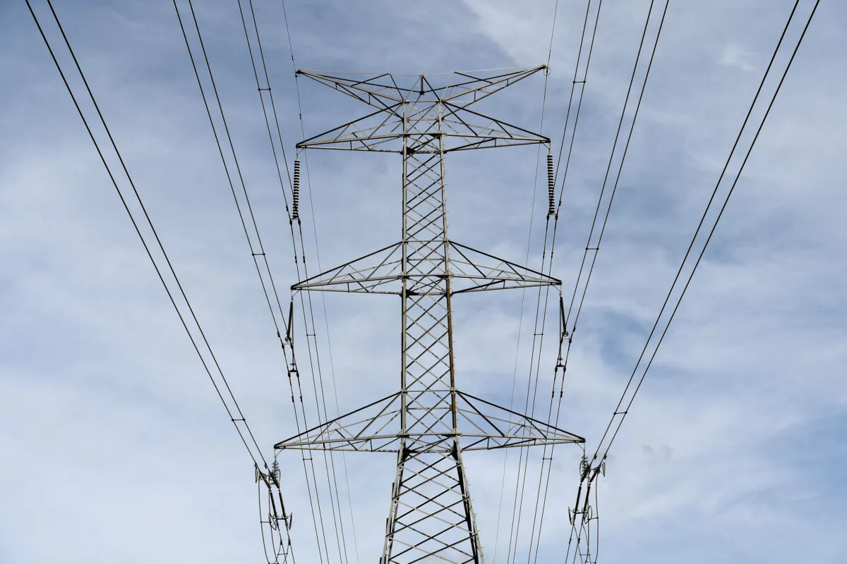 A stock image of an electricity tower going through a rural property in Sydney, Tuesday, October 17, 2017. (AAP Image/Brendan Esposito) NO ARCHIVING