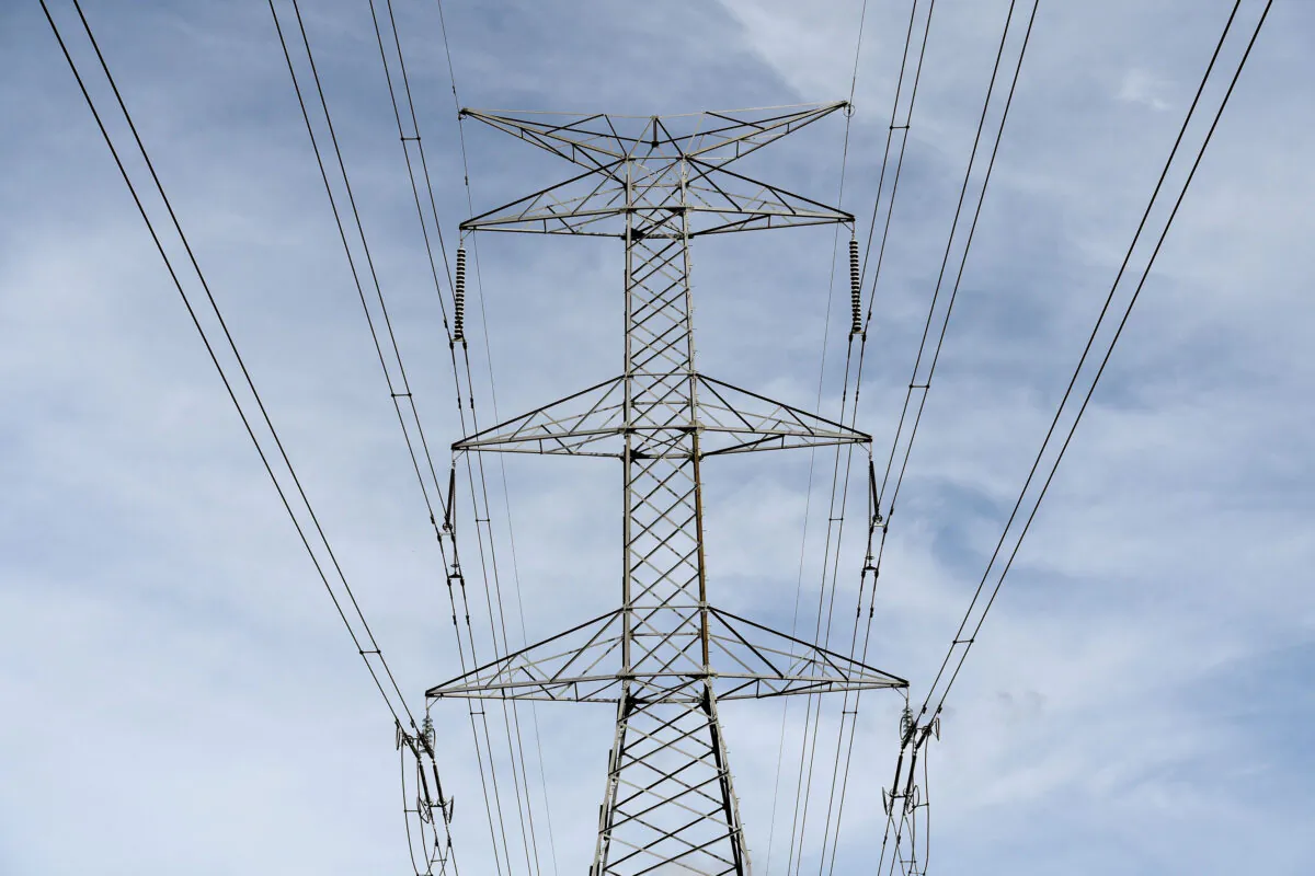 A stock image of an electricity tower going through a rural property in Sydney, Tuesday, October 17, 2017. (AAP Image/Brendan Esposito) 