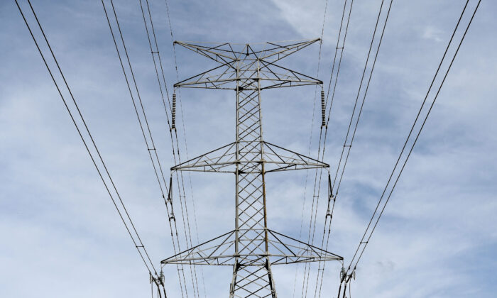 A stock image of an electricity tower going through a rural property in Sydney, Tuesday, October 17, 2017. (AAP Image/Brendan Esposito) 