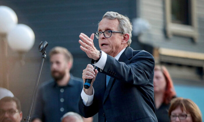 Ohio Gov. Mike DeWine speaks to mourners at a memorial service in the Oregon District held to recognize the victims of a mass shooting in the popular nightspot in Dayton, Ohio, on Aug. 4, 2019. (Scott Olson/Getty Images)