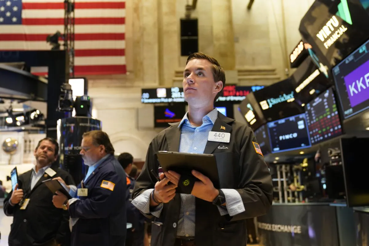 Traders work on the floor at the New York Stock Exchange on June 14, 2022. (Seth Wenig/AP Photo)