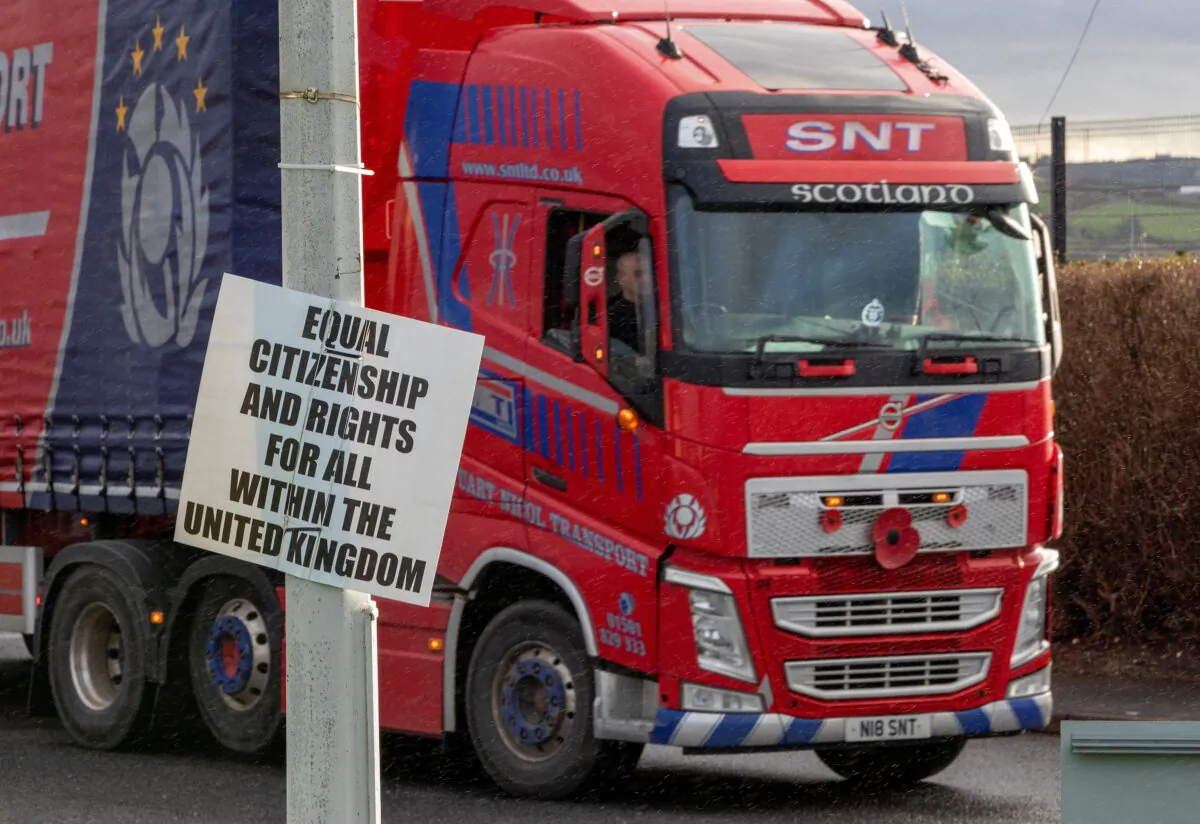 A lorry which has arrived on a ferry from Stranraer in Scotland leaves Larne port, north of Belfast in Northern Ireland, on Feb. 3, 2022. (Paul Faith /AFP via Getty Images)