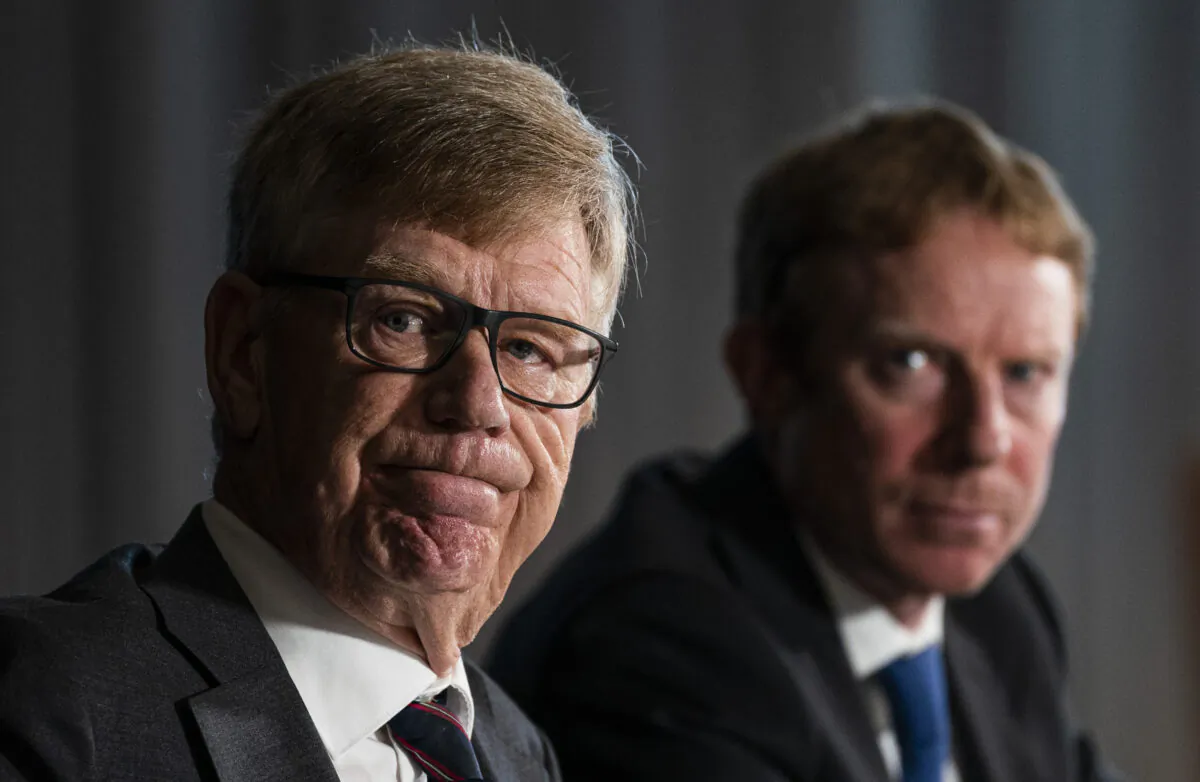 Commissioner Austin Cullen (L) and Patrick McGowan, senior commission counsel, listen to a question while meeting with reporters after releasing the report from the Inquiry Into Money Laundering in British Columbia, in Vancouver on June 15, 2022. (The Canadian Press/Rich Lam)