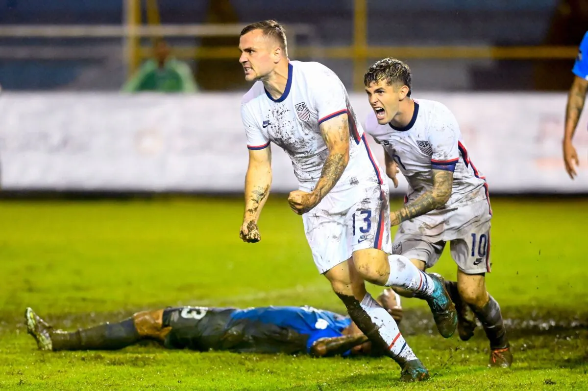 USA's Jordan Morris (L), and Christian Pulisic celebrate a goal against El Salvador during their Concacaf Nations League football match at the Cuscatlan Stadium, in San Salvador, on June 14, 2022. (Marvin Recinos/AFP via Getty Images)