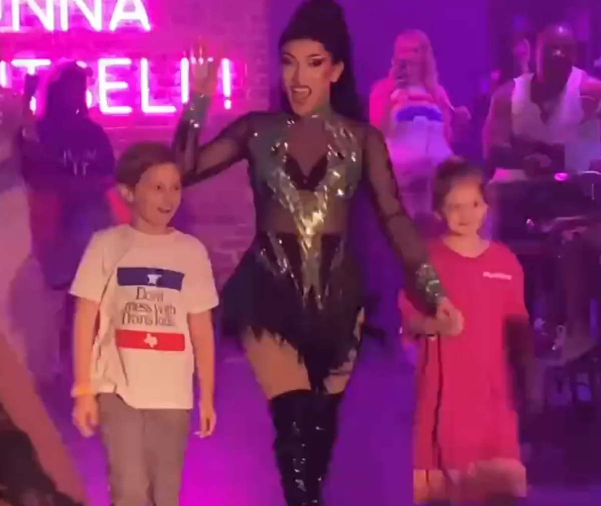 Screenshot from video posted on social media of a June 4, 2022, drag show at a gay bar in Dallas—billed as "family friendly"—where children were encouraged to participate in the performance and to give the performers money. (Courtesy of Tayler Hansen)