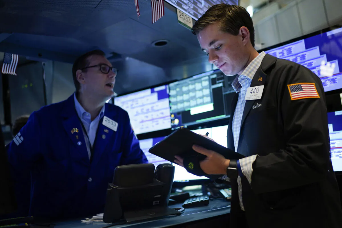 Traders work on the floor at the New York Stock Exchange in New York on June 15, 2022. (Seth Wenig/AP Photo)