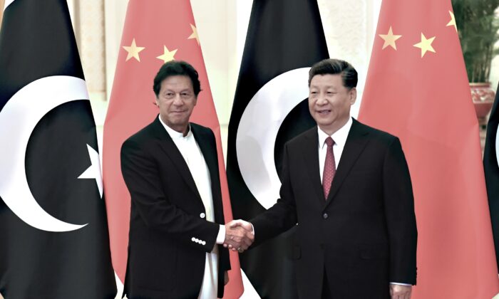Chinese leader Xi Jinping shakes hands with Pakistani Prime Minister Imran Khan before a meeting at the Great Hall of the People in Beijing, China, on April 28, 2019. (Madoka Ikegami/Getty Images)