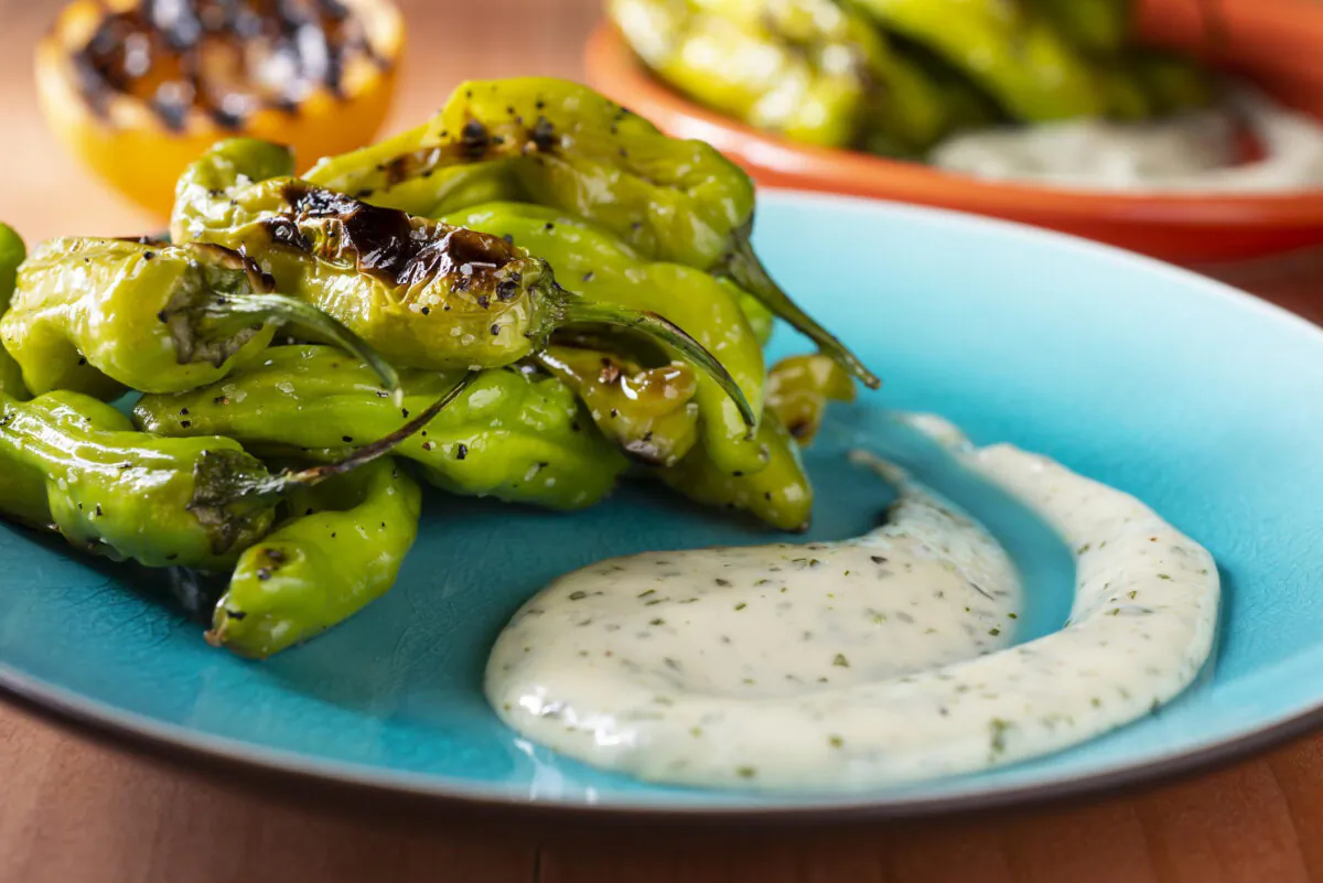 blistered shishito peppers. (rudisill / E+ via Getty Images Plus)