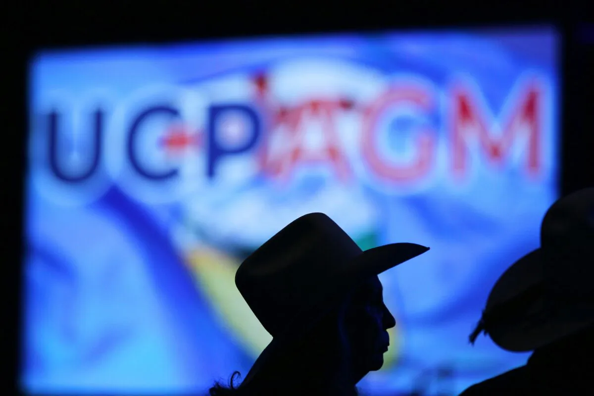 Delegates linger at the end of the first evening of the Alberta United Conservative Party Annual General Meeting in Calgary on Nov. 29, 2019. (The Canadian Press/Dave Chidley)