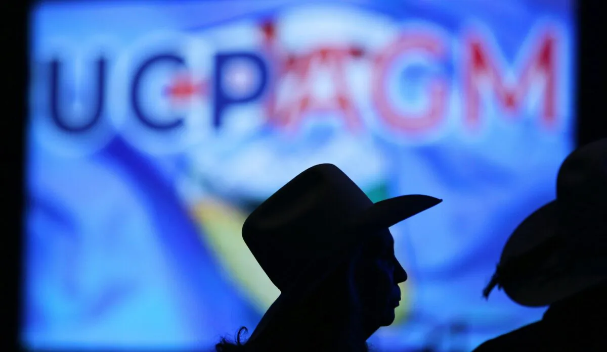 Delegates linger at the end of the first evening of the Alberta United Conservative Party Annual General Meeting in Calgary on Nov. 29, 2019. (The Canadian Press/Dave Chidley)