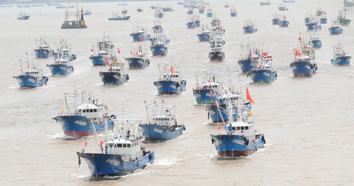 Fishing boats set sail for the East China Sea from a port in Zhoushan, Zhejiang Province, China, on Aug. 1, 2021. (Chen Yongjian/VCG via Getty Images)