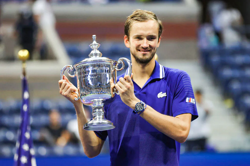 Daniil Medvedev of Russia celebrates with the championship trophy after defeating Novak Djokovic of Serbia to win the Men's Singles final match of the 2021 U.S. Open at the USTA Billie Jean King National Tennis Center in New York on Sept. 12, 2021. (Matthew Stockman/Getty Images)