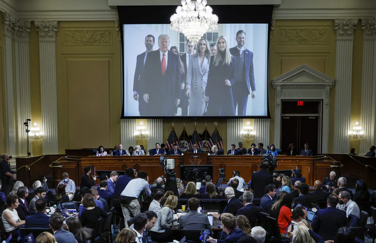 An image of former President Donald Trump and his family is displayed on screen during the third hearing of the Jan. 6 Committee on Capitol Hill in Washington on June 16, 2022. (Drew Angerer/Pool/AFP via Getty Images)