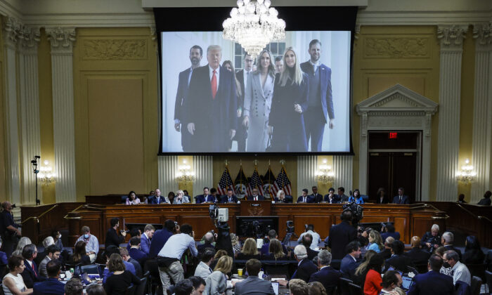 An image of former President Donald Trump and his family is displayed on screen during the third hearing of the January 6 committee on Capitol Hill in Washington on June 16, 2022. (Drew Angerer/Pool/AFP via Getty Images)