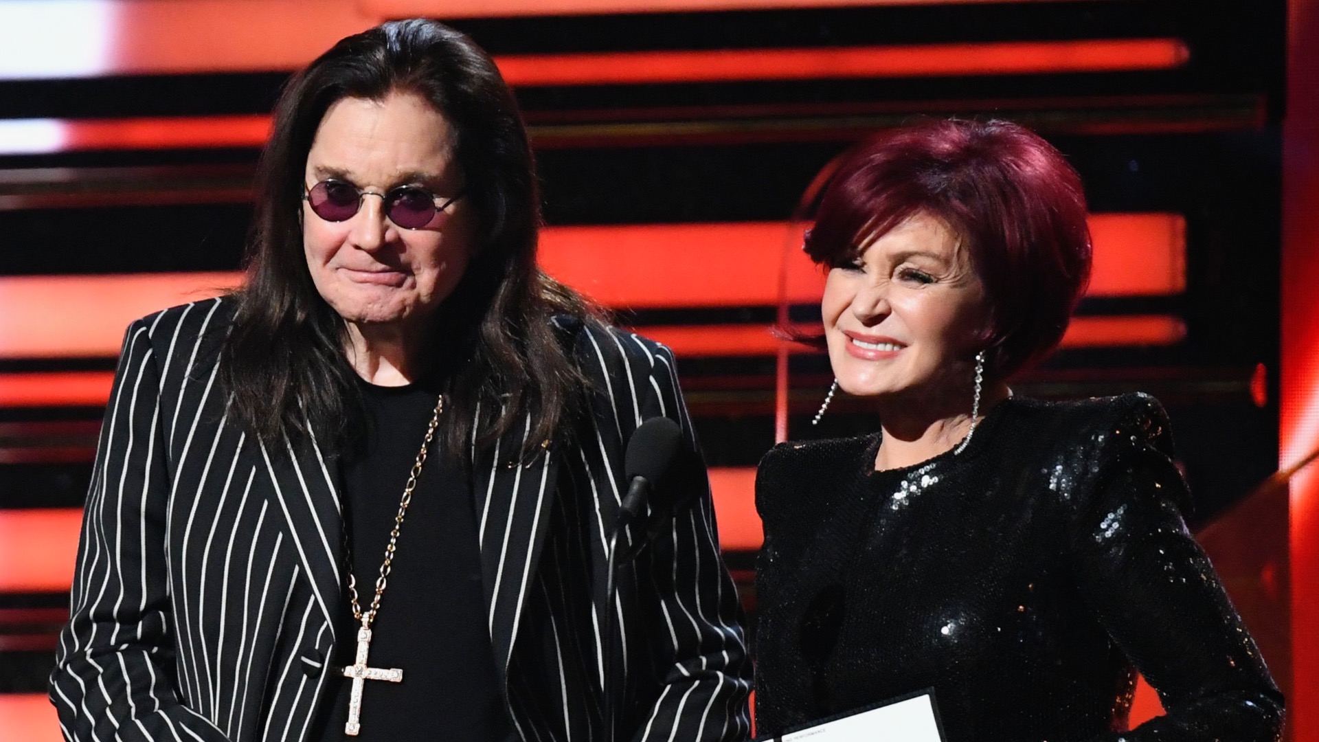 Ozzy Osbourne, 73, supported by wife Sharon, 69, in performance at