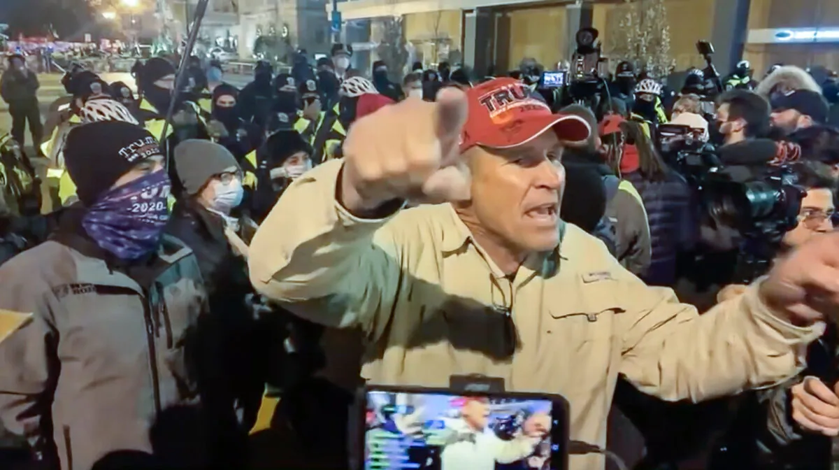 Ray Epps encourages protesters to go into the U.S. Capitol the night before the breach of Jan. 6, 2021. (Villain Report/Screenshot via The Epoch Times)
