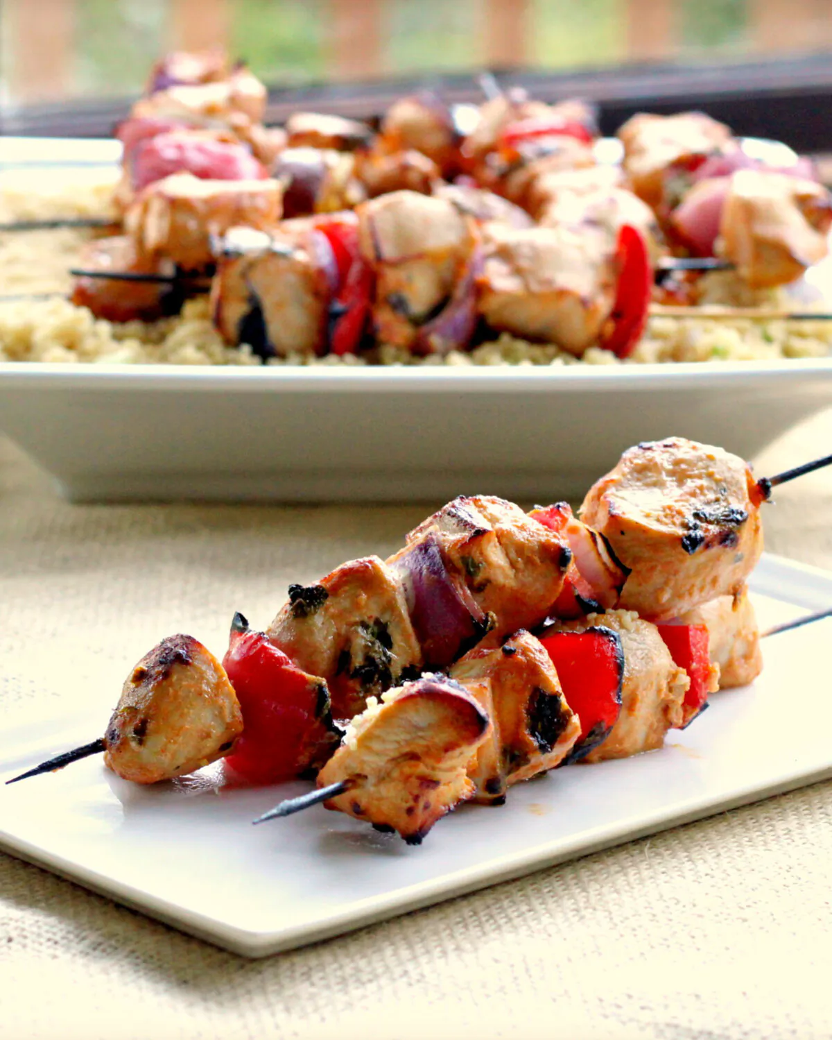 A sweet, tangy, spicy marinade does double duty in terms of boosting flavor and tenderizing the chicken breast meat in these grilled skewers. (Lynda Balslev for Tastefood)