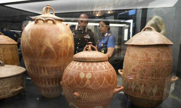 Etruscan jars from the 7th century B.C. are displayed in the new "Museum of Rescued Art" in Rome on June 15, 2022. (Alessandra Tarantino/AP Photo)