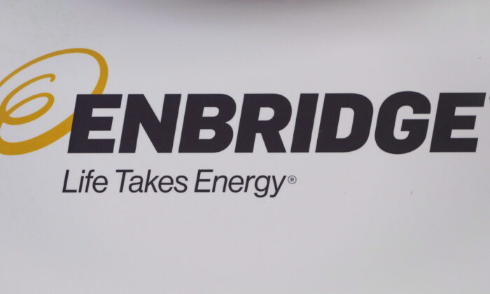 The Enbridge logo is shown at the company's annual meeting in Calgary on May 9, 2018. (Jeff McIntosh/The Canadian Press)