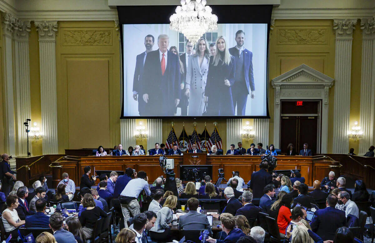 An image of former President Donald Trump and his family is displayed on screen during the third hearing of the January 6 Committee on Capitol Hill in Washington on June 16, 2022. (Drew Angerer/Pool/AFP via Getty Images)