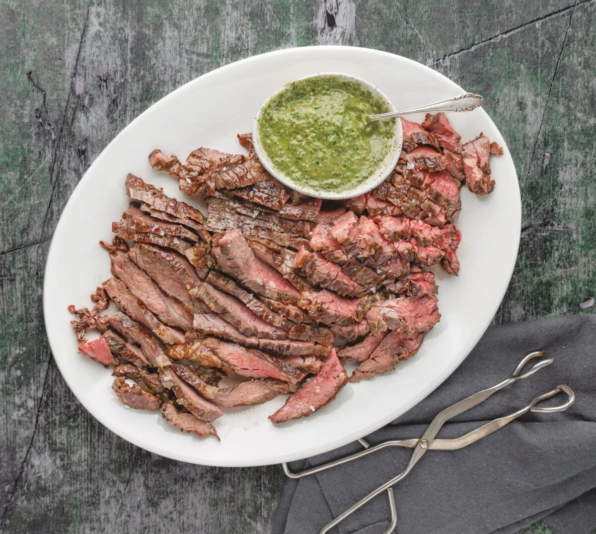 Grilled bavette makes a simple, crowd-pleasing centerpiece—as long as you remember to slice it against the grain. (Ken Goodman)