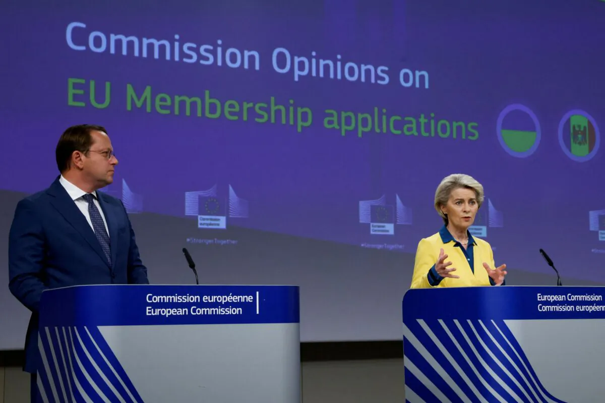 European Commission President Ursula von der Leyen speaks as she attends a news conference, with European Commissioner for Neighbourhood and Enlargement Oliver Varhelyi, after a meeting of the College of European Commissioners addressing its opinion on Ukraine's EU candidate status, in Brussels, Belgium, on June 17, 2022. (Yves Herman/Reuters)