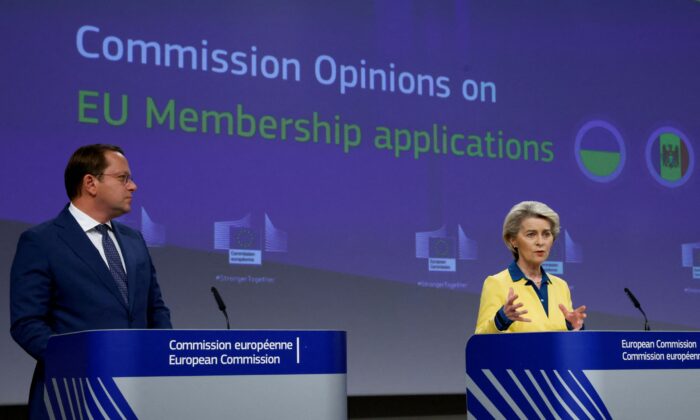European Commission President Ursula von der Leyen speaks as she attends a news conference, with European Commissioner for Neighbourhood and Enlargement Oliver Varhelyi, after a meeting of the College of European Commissioners addressing its opinion on Ukraine's EU candidate status, in Brussels, Belgium, on June 17, 2022. (Yves Herman/Reuters)
