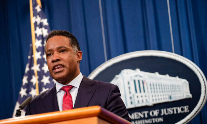 Assistant Attorney General Kenneth Polite Jr. speaks to a press briefing in Washington on Oct. 26, 2021. (Roberto Schmidt/AFP via Getty Images)