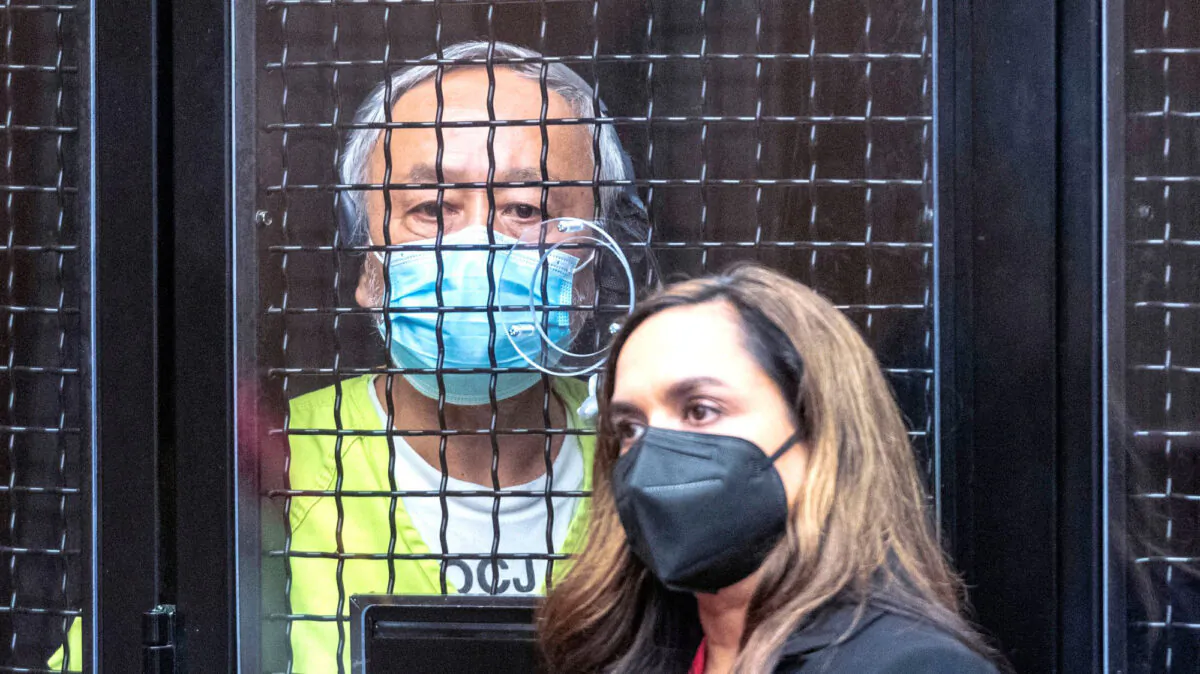 David Wenwei Chou (L), the 68-year-old Las Vegas man accused of carrying out a shooting rampage at a Laguna Woods church, makes his first in-person appearance in superior court for an arraignment, with Deputy Public Defender Jennifer Ryan in Santa Ana, Calif., on June 10, 2022. (Mark Rightmire/Orange County Register/TNS)